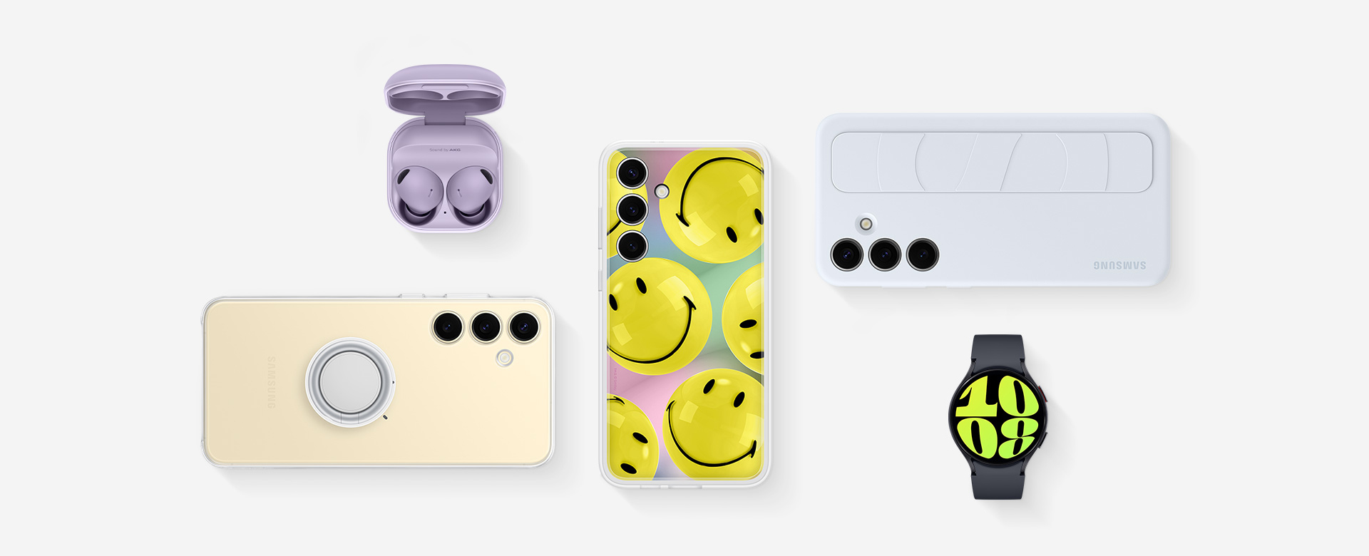 一系列 Galaxy S24 Plus 配件包括：Galaxy Buds2 Pro 為 Bora 紫，底座打開且耳機已就位，Galaxy S24 Plus 已安裝透明多功能保護殼，Galaxy S24 Plus 已安裝黃色智能主題保護殼，Galaxy S24 Plus 安裝了淺藍色矽膠薄型保護殼(附指環帶)，Galaxy SmartTag2 為白色，Galaxy Watch6 為黑色。